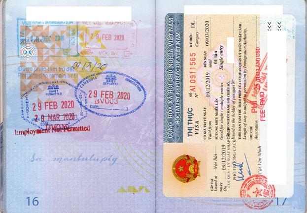 a Philippines passport page showing a visa sticket from Vietnam and visa stamps - Vietnam visa for Filipinos